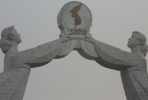 A monument to Korean cooperation outside Kaesong. Photo by gadgetdan on flickr.