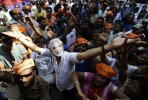 Suporters of Narendra Modi celebrate his victory in India's elections. Photo by AFP.